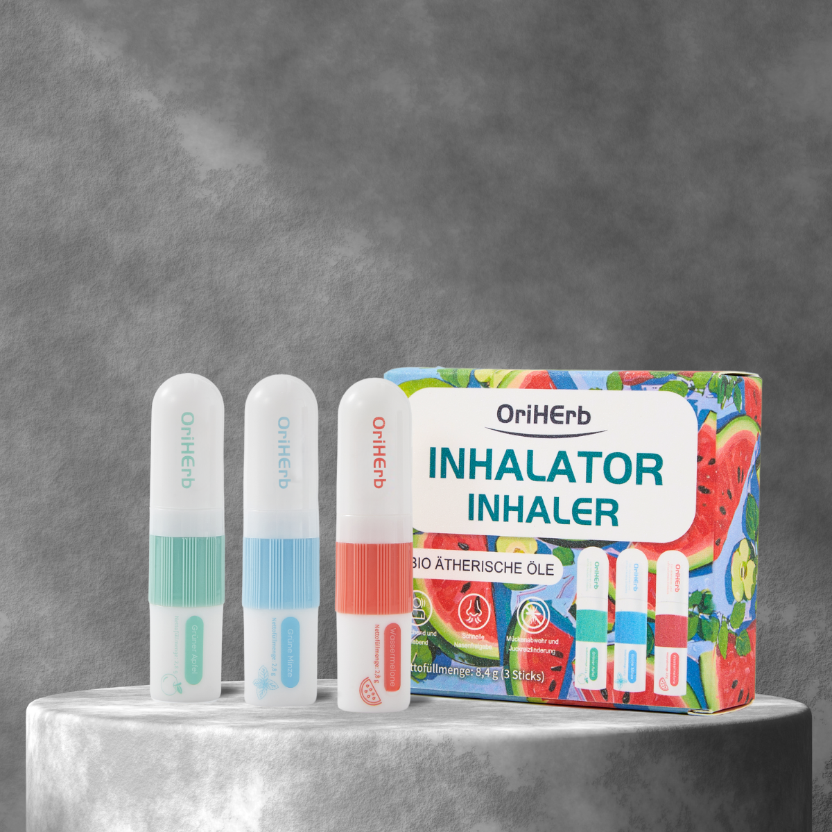 OriHerb Inhalator 3er-Set – natürliche Verpackung mit Apfel, Minze und Wassermelone im Freien